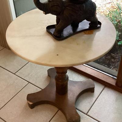Sale Photo Thumbnail #289: Small round table with dark wood base