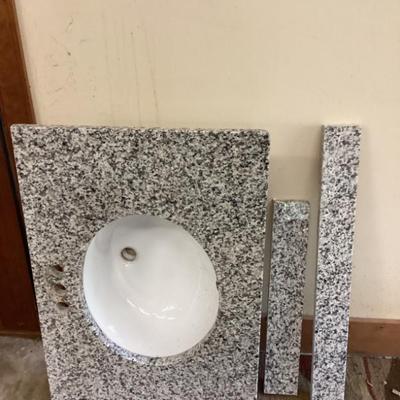 Sink with granite countertop backsplash sidesplash