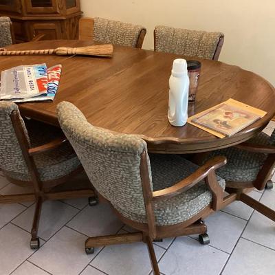 Sale Photo Thumbnail #253: Oak dining table with 6 chairs on wheels