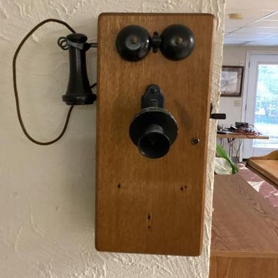 Wall mounted hand crank telephone