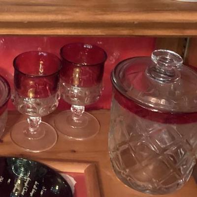 Sale Photo Thumbnail #189: Red and clear lidded jars and wine goblets