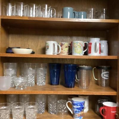 Sale Photo Thumbnail #322: Variety of glassware and coffee mugs