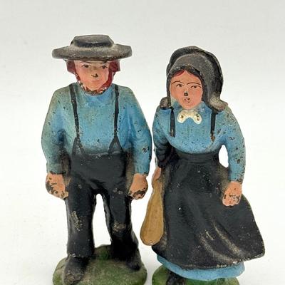 (2) Cast Iron Amish Figurines
