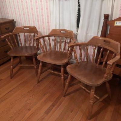 Three maple captain’s chairs