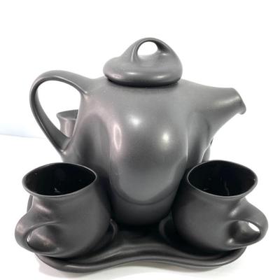 Sale Photo Thumbnail #78: This is a Peter Saenger Modernist Porcelain Tea Service Set