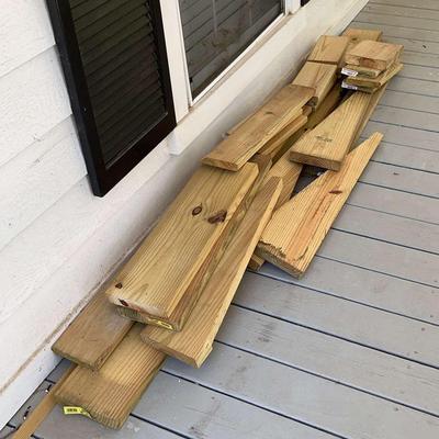 Collection of Pressure-Treated Lumber Boards