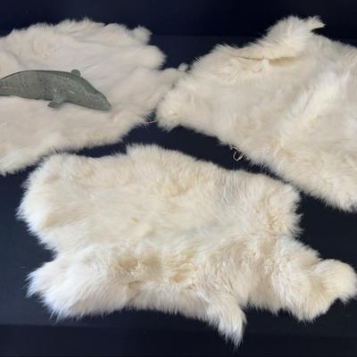 White Rabbit Pelts and Soapstone Porpoise 