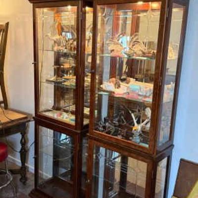 Pair of lighted glass front display cabinets