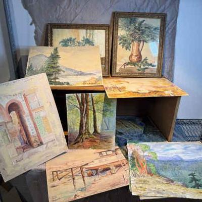 A collection of watercolors a wood crate