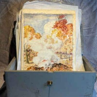 Wood box full of watercolor paintings