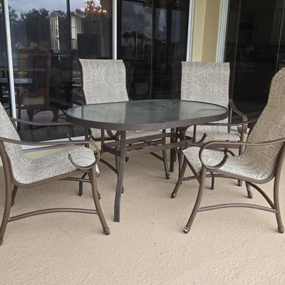 Glass Oval Table & Four Chairs