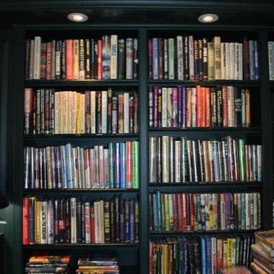 Sale Photo Thumbnail #97: Library shelves full of First Edition Books. 