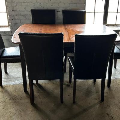 Six Colamy Faux Leather Parson's Type Chairs with a Wood Finish Dining Table