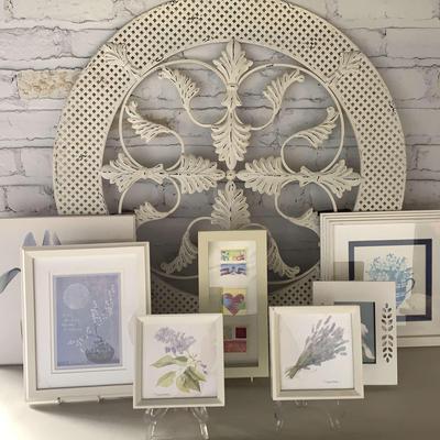 White Framed Artwork And Large Round White Metal Wall Art