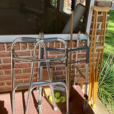 Two Folding Walkers, Pair Of Crutches, Cane & More