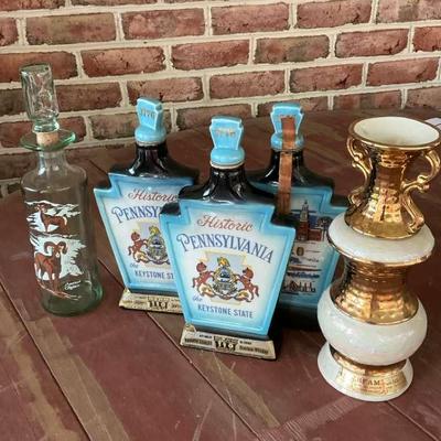Four Collectible Whiskey Bottles