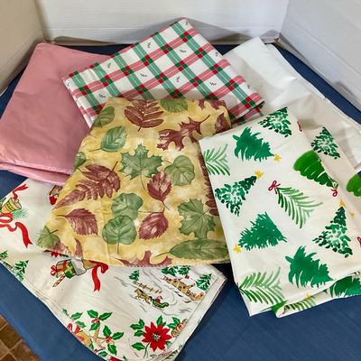 Seven Assorted Vinyl Spill Resistant Tablecloths