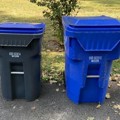 Two Trash Cans On Wheels