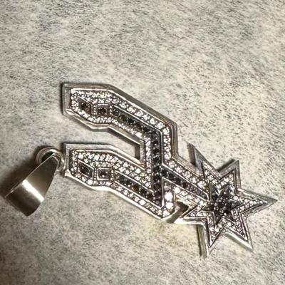 The San Antonio for pendant special made for me by a special jeweler. Nobody else has one except my husband.