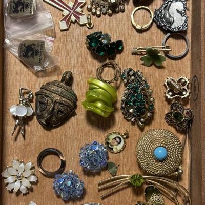 Sale Photo Thumbnail #43: Vintage jewelry, Estee Lauder pendant, the one with the blue in the center. 