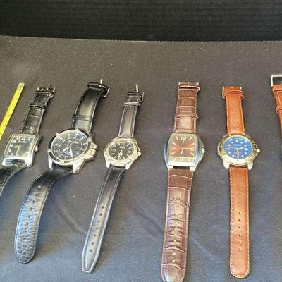 Assortment Of Men’s Watches With Black and Brown Leather Bands Various Face Sizes