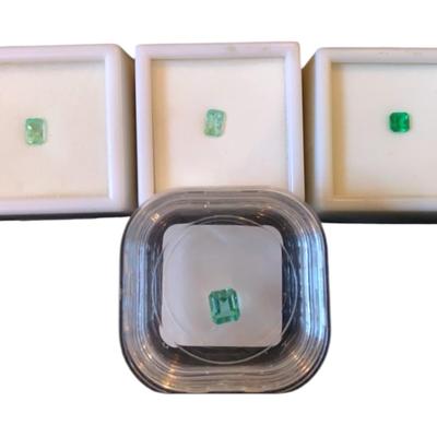 Emerald Cut Emeralds: Two 0.5CT Colombian, One 0.25CT Afghanistan, One 0.9CT Eternity Natural