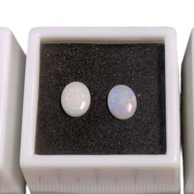Two 11x9mm Oval Australian Opals And Matched Pair Of 9x7mm Australian Opals
