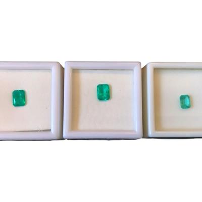 Two 1.0CT Emerald Cut Lab Created Emeralds, One 0.70CT Emerald Cut Brazilian Emerald