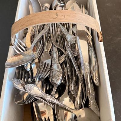 A Large Assortment Of Silverware