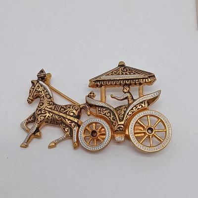 Share
Spanish Democene Brooch Horse And Buggy Rotating Wheels Carriage