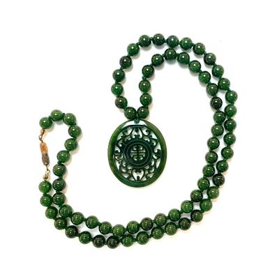 Sale Photo Thumbnail #53: Jade necklace w/ carved pendant