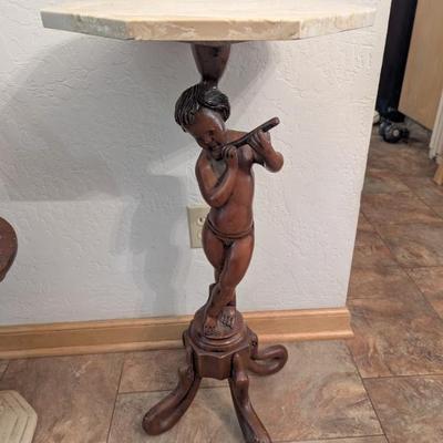 Beautiful carved walnut cherub stand table with marble top