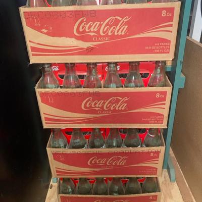 4 Boxes Of Coke Bottles