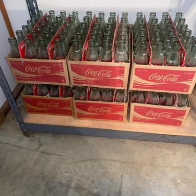 6 Boxes Of Coke Bottles