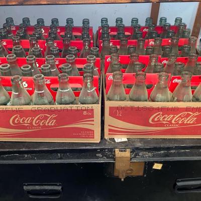 4 Boxes Of Coke Bottles