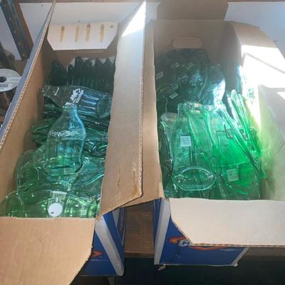 Flattened Coke Bottles