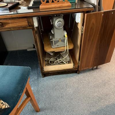 Custom built, sewing table with Hideaway sewing machine area