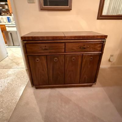 Dining room serving buffet with storage