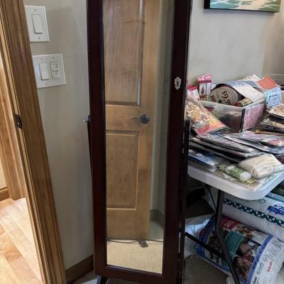 Mirrored locking jewelry cabinet 