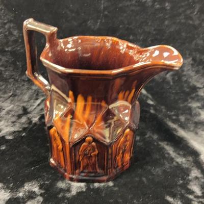 Rockingham glazed pitcher unsigned, might be swinton
