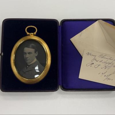 Golden framed portrait and personal note in case, 1900