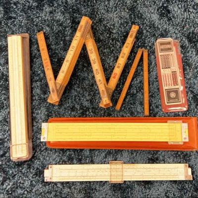Vintage rulers slide rules, arithma manual calculator