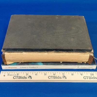Vintage calculation book and retro pc guide