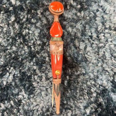 Scottish daggar pin with red toned stones