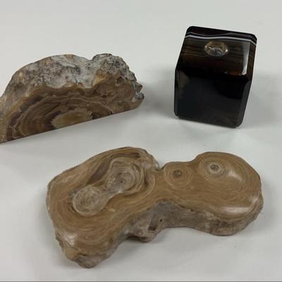 Banded agate agate compass paperweight and… calcite petrified wood