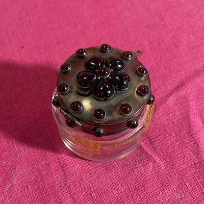 Lovely red stone and silver colored glass pot