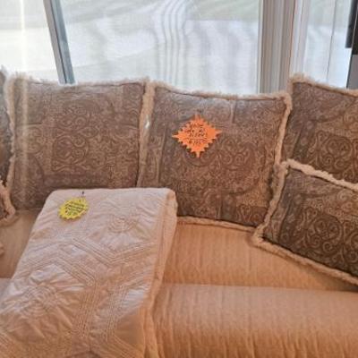 Sofa with pillows now $97.50