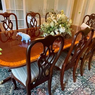 Stickley dining table with 8 upholstered mahogany chairs