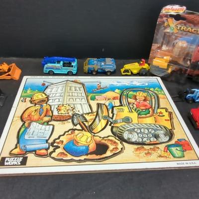 Construction Vehicles One In Package And A Construction Puzzle 