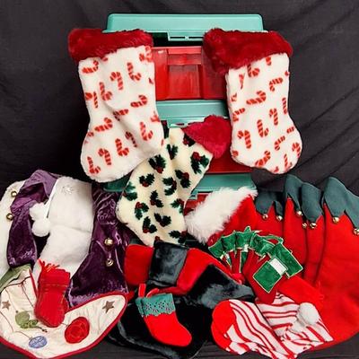 Christmas Stockings Galore And Four Red And Green Storage Containers 